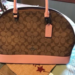 Pink and brown coach purse